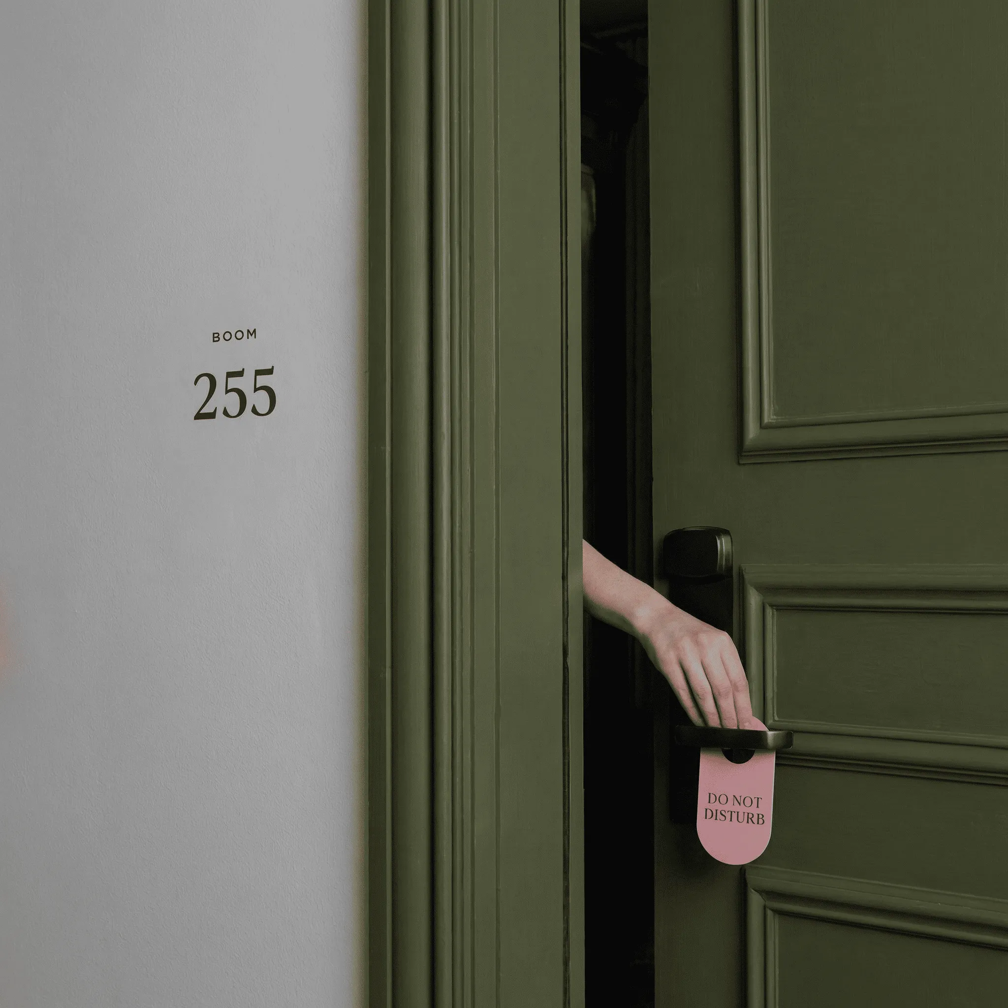 Do not disturb sign on a hotel room door